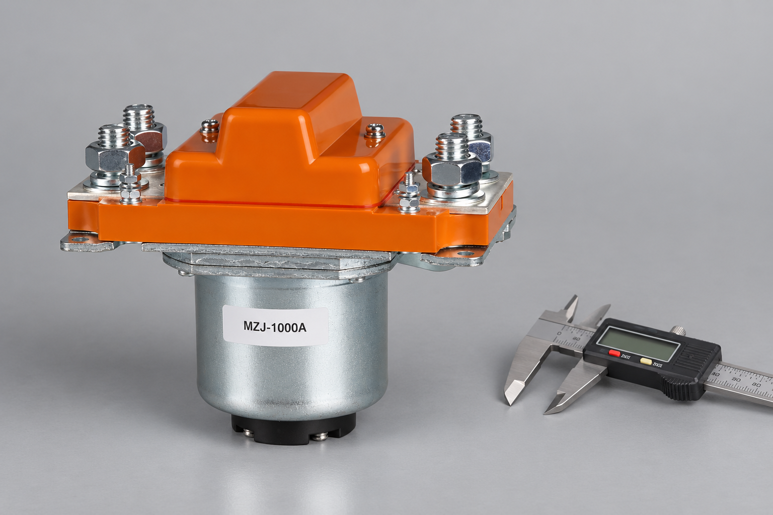 MZJ-1000A unpowered DC contactor beside a separate caliper on an inspection bench