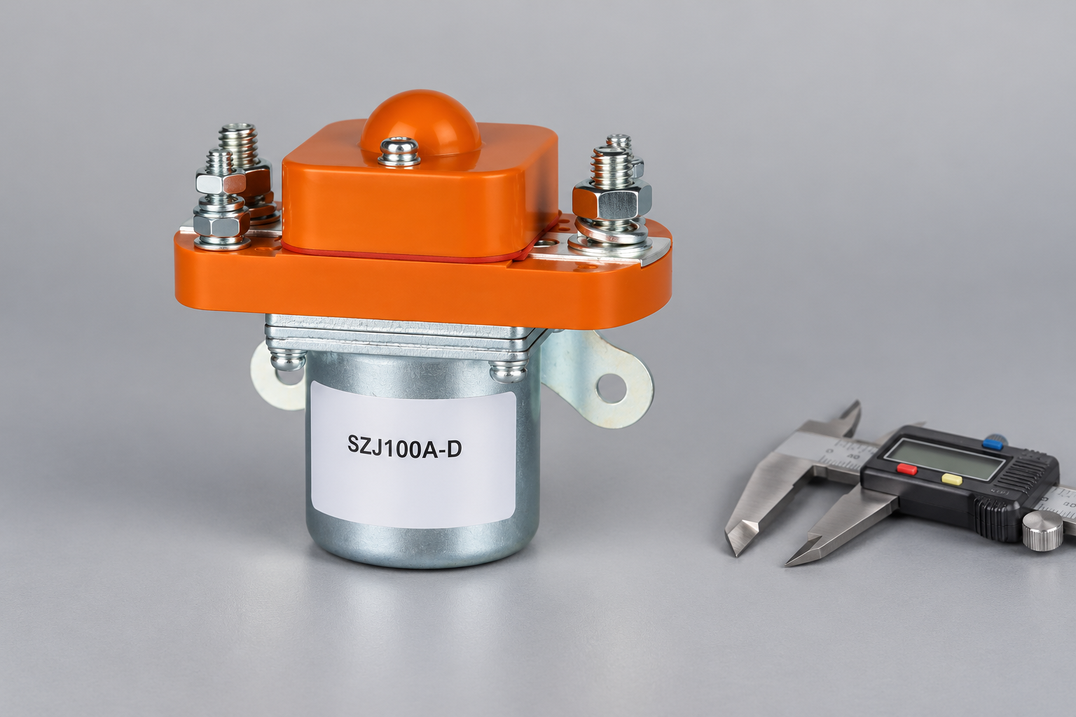 SZJ100A-D unpowered DC contactor beside a separate caliper on an inspection bench